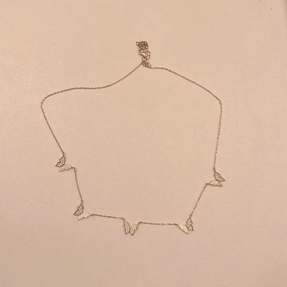 gold necklace with butterflies